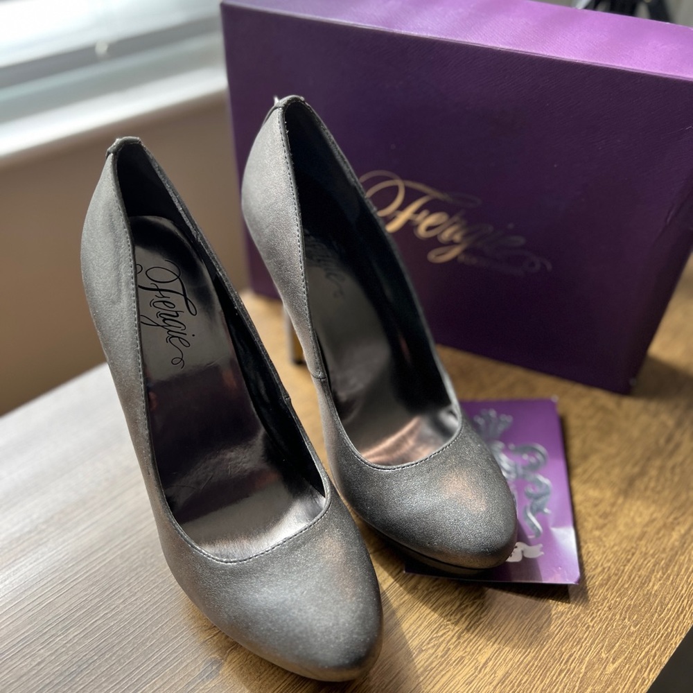 These shoes are stunning!!  A platform in the front and stiletto in the back.